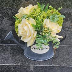 Mini Watering can filled with lemon roses 
